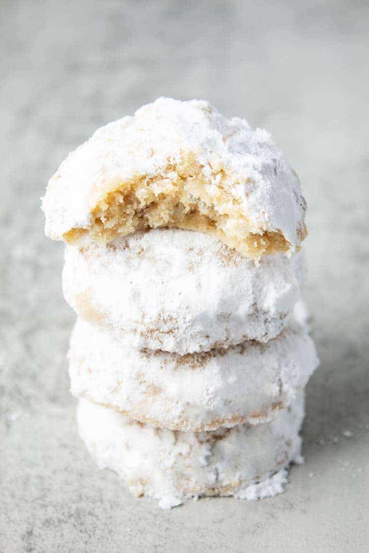 stack of keto snowballs cookies on countertop