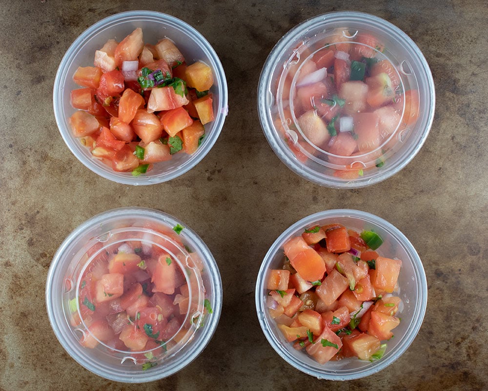 keto chipotle fresh tomato salsa in four containers two with lids off