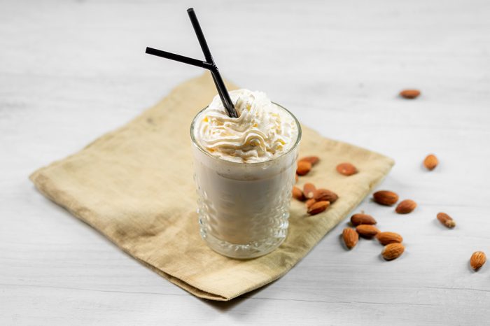 keto crack coffee keto coffee with almonds scattered about