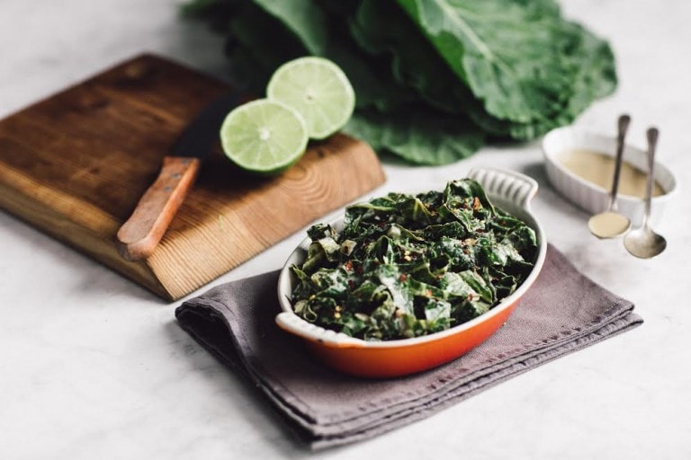 keto tahini collard greens in a small red bowl