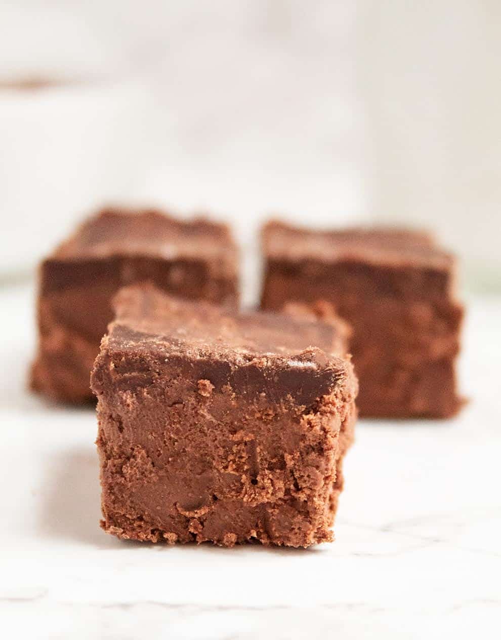 small pieces of keto nutella bars in front of a white background