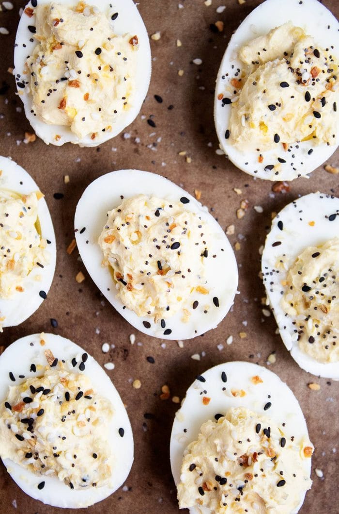 aerial view of keto deviled eggs cut in half and sprinkled with everything bagel seasoning