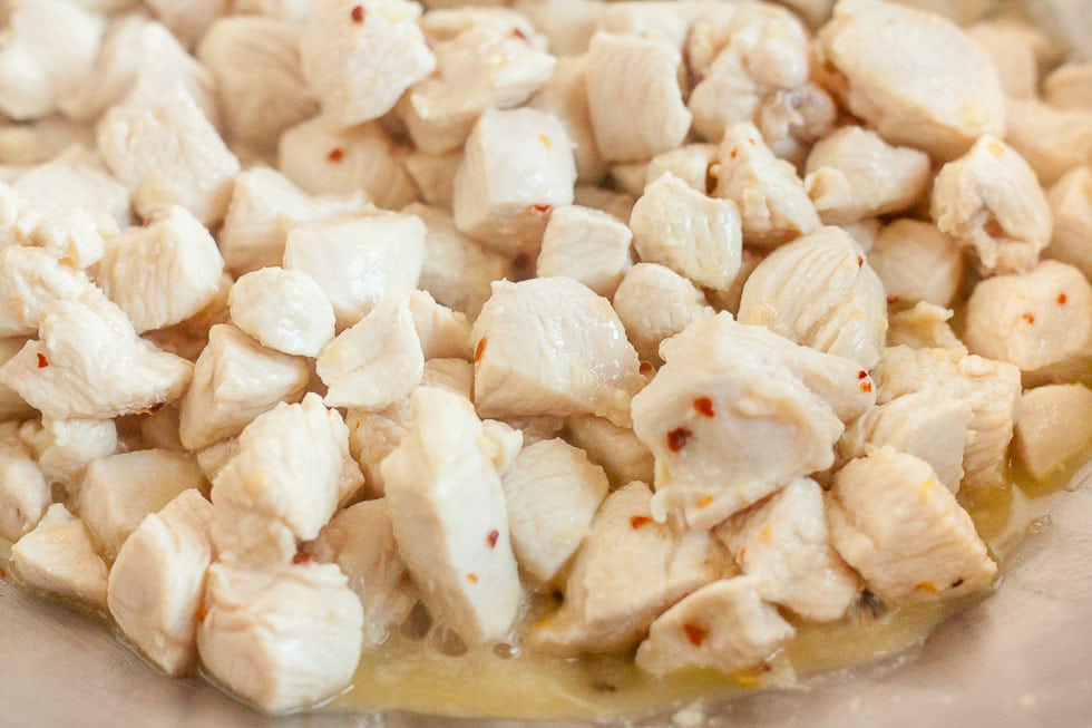 closeup of chopped cooked chicken for recipe