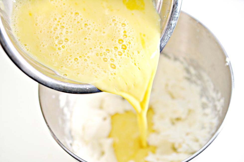 overhead view of keto french toast loaf ingredients being poured into a pan