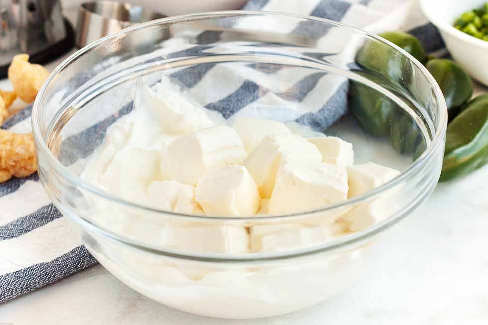 bowl containing cubed cream cheese