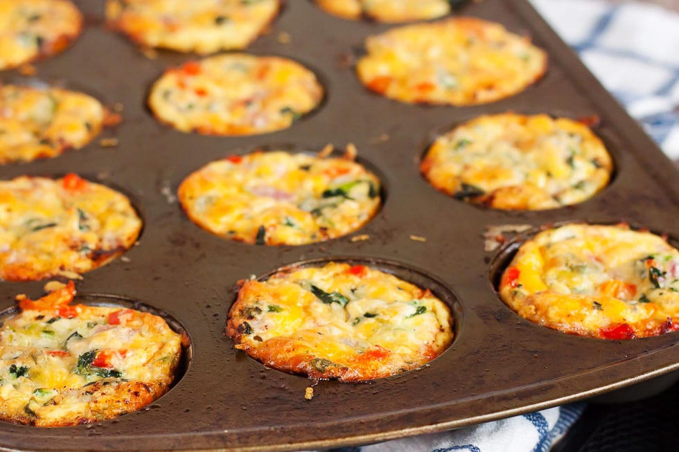 fully baked keto mini quiches in a muffin tin