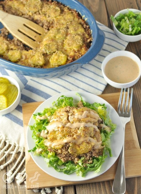 keto ground beef casserole recipes with cheese sesame seed pickles and lettuce on serving dish