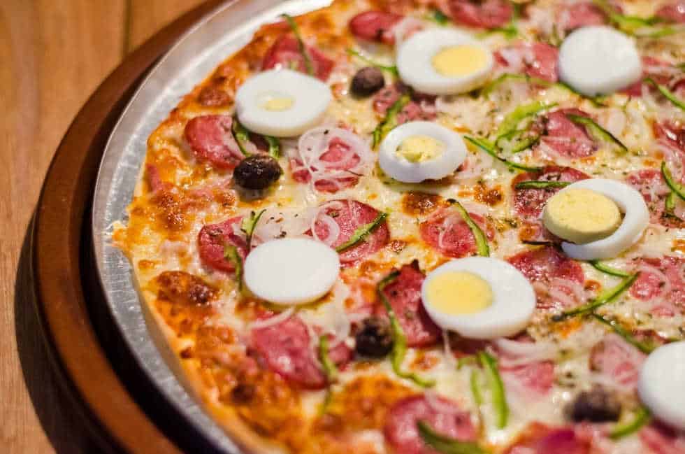 keto pizza recipes on a silver platter with hard boiled egg on top