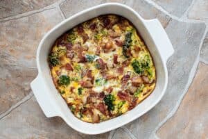 rotated white casserole dish containing cooked keto breakfast casserole