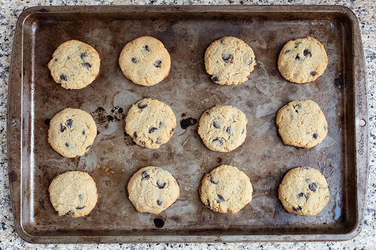 fully baked low carb chocolate chip cookies on a baking sheet