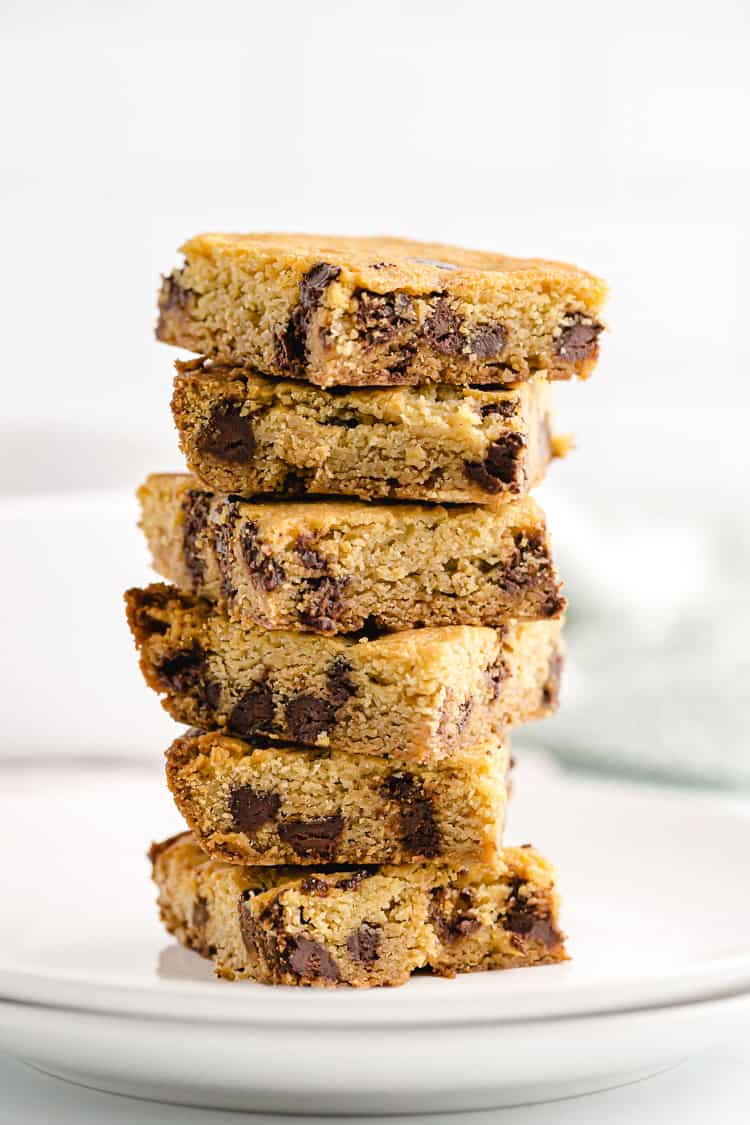 keto chocolate chip cookie casserole bars stacked on dish