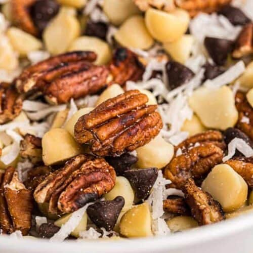 closeup view of low carb trail mix in a large white bowl
