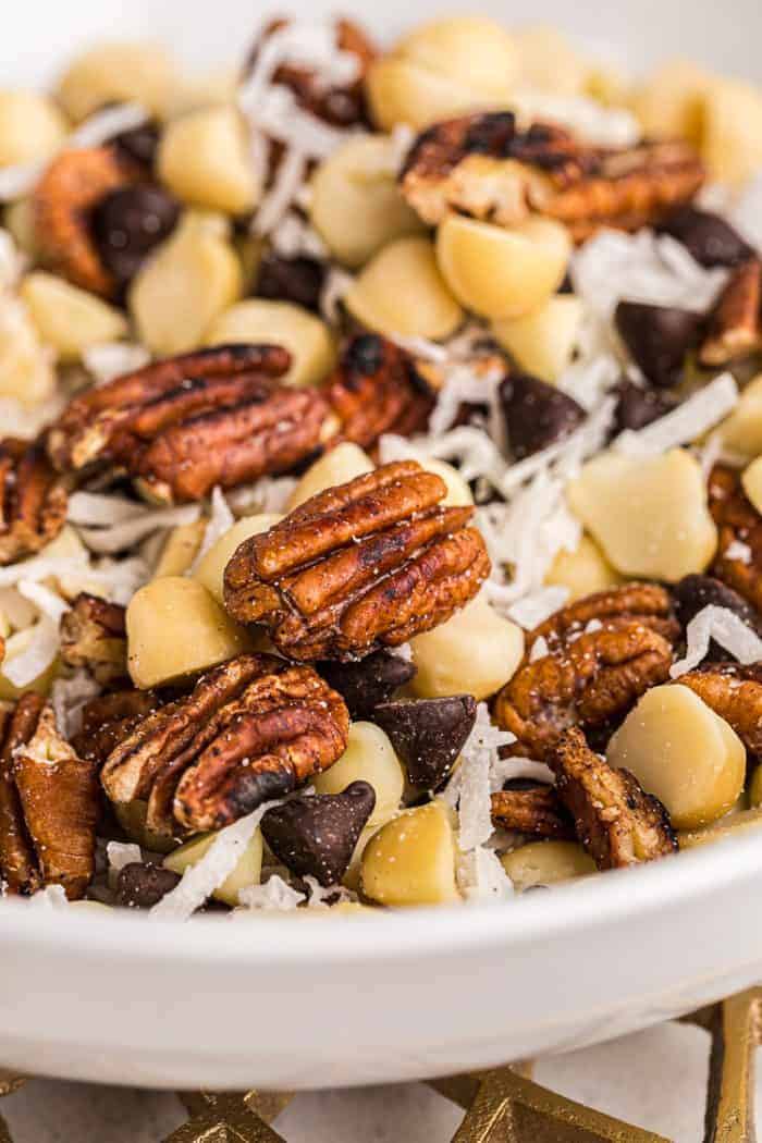 closeup view of low carb trail mix in a large white bowl