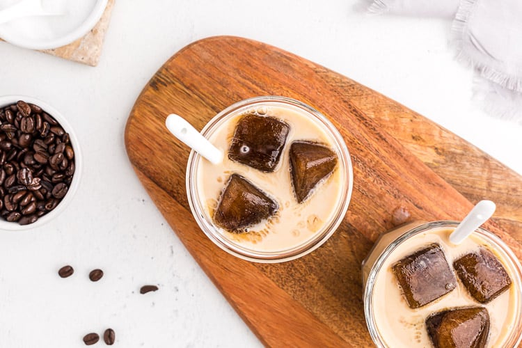 overhead view of keto easy iced coffee after milk has been added to glasses