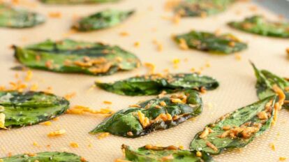 roasted spinach with parmesan cheese on baking sheet