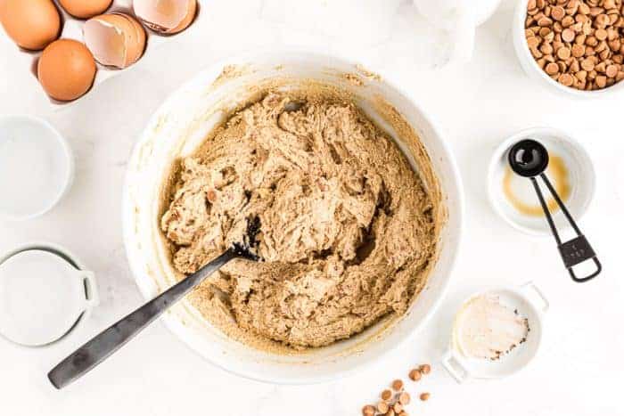 overhead view of low carb butterscotch cookie batter in a bowl