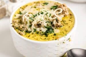 small white soup bowl containing low carb mushroom soup with turkey