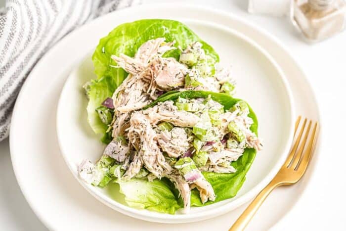 keto chicken salad in bibb lettuce leaves on a plate