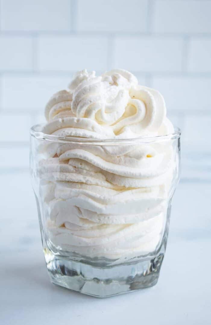 clear glass with piped keto whipped cream inside