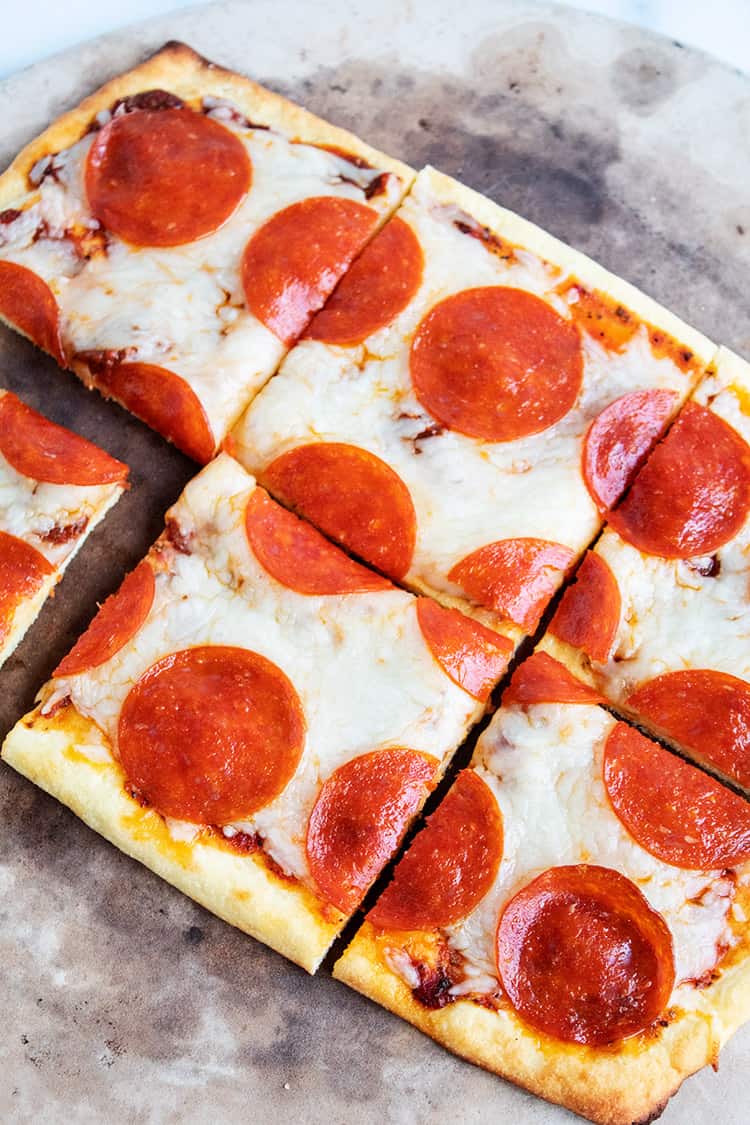 overhead view of six slices of keto pepperoni pizza