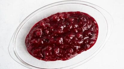 overhead view of keto cranberry sauce in glass container