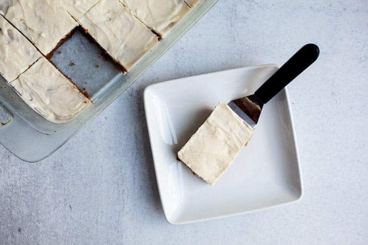 keto pumpkin cookies bar on a white plate next to dish