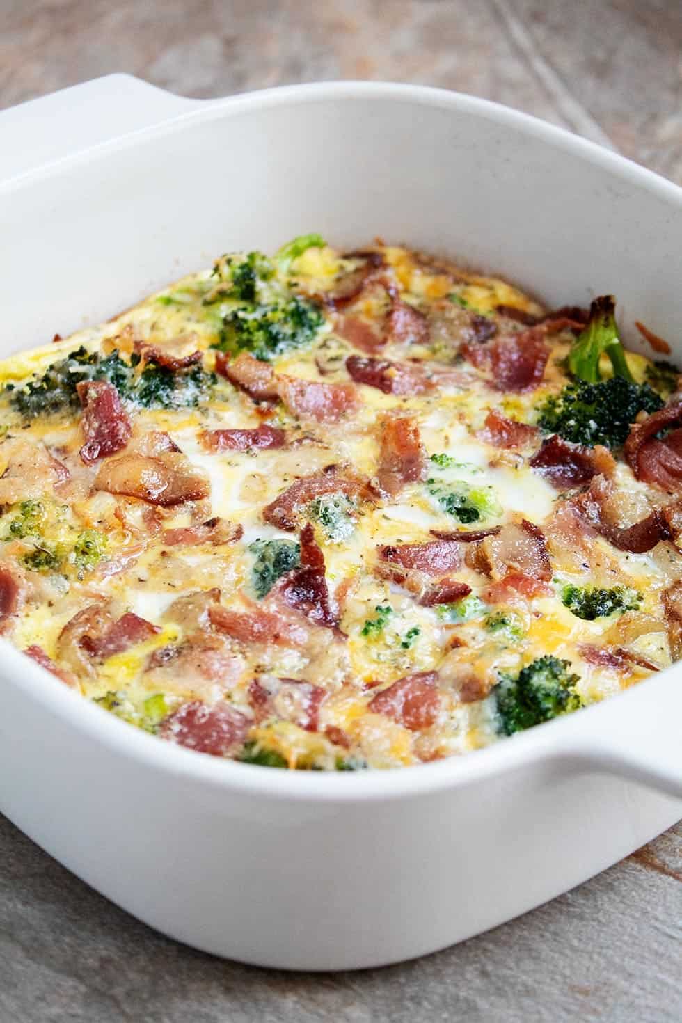 closeup of white casserole dish containing keto breakfast casserole fully baked