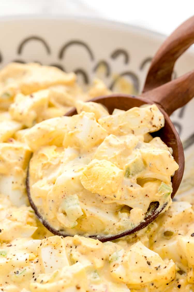 closeup of wooden spoon with keto egg salad
