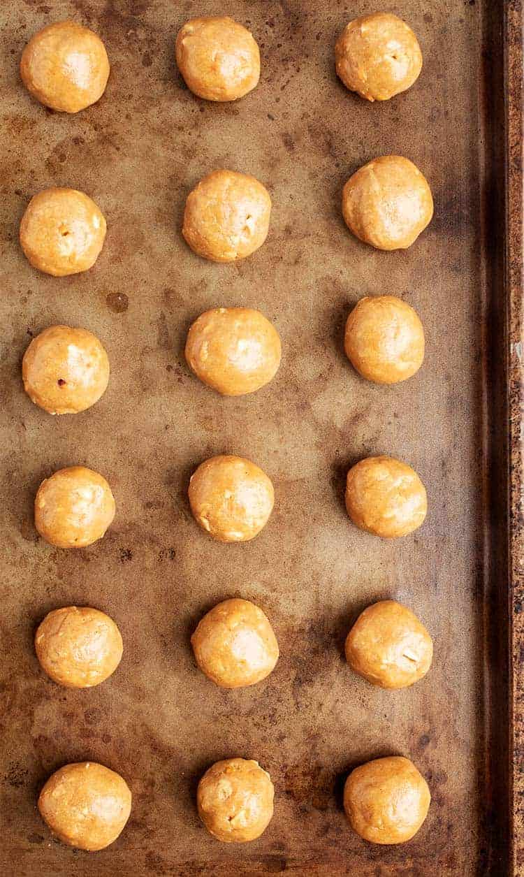 overhead view of 3 ingredient peanut butter balls on cookie sheet