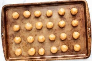 3 ingredient peanut butter balls on a baking tray