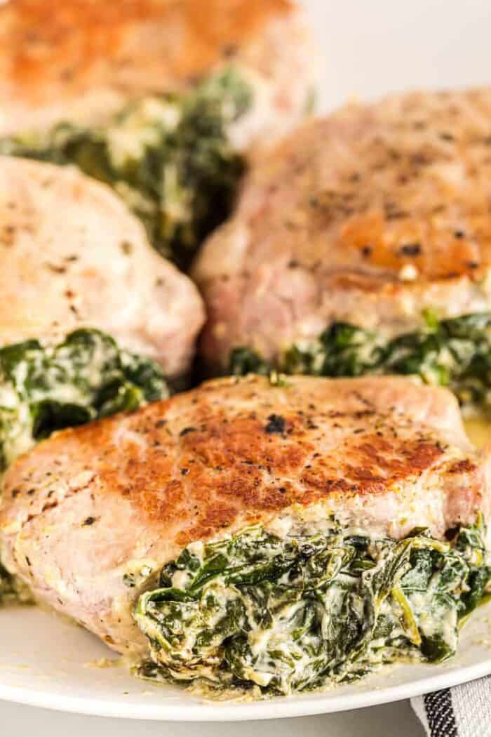 keto pork chops stuffed with spinach on a plate