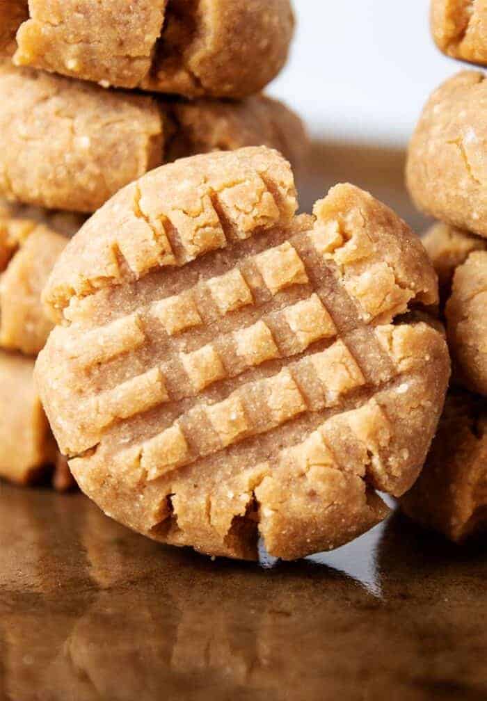 stack of keto peanut butter cookies on cookie sheet