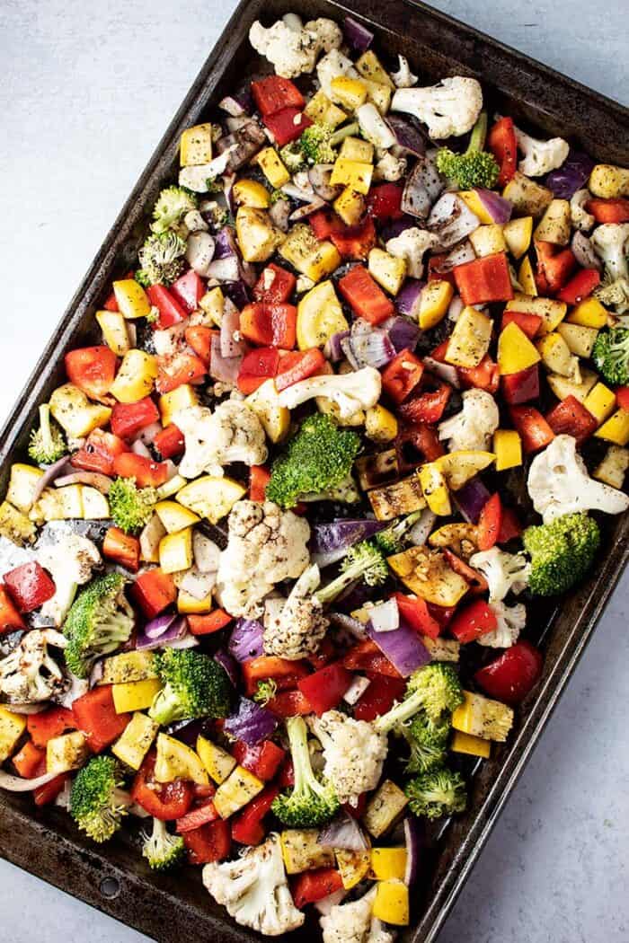 overhead view of large baking sheet of keto roasted vegetables