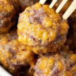 overhead view of keto sausage balls ready to serve with a fork in one of them